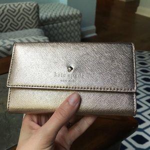 Rose Gold Kate Spade wristlet wallet